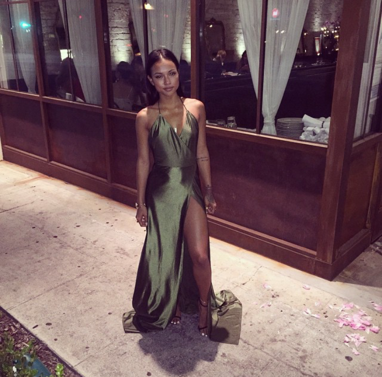 Splurge: Karrueche Tran’s Rap Up x Hennessy Event Just Enaj Femma LA Olive Green High Slit Evening Gown