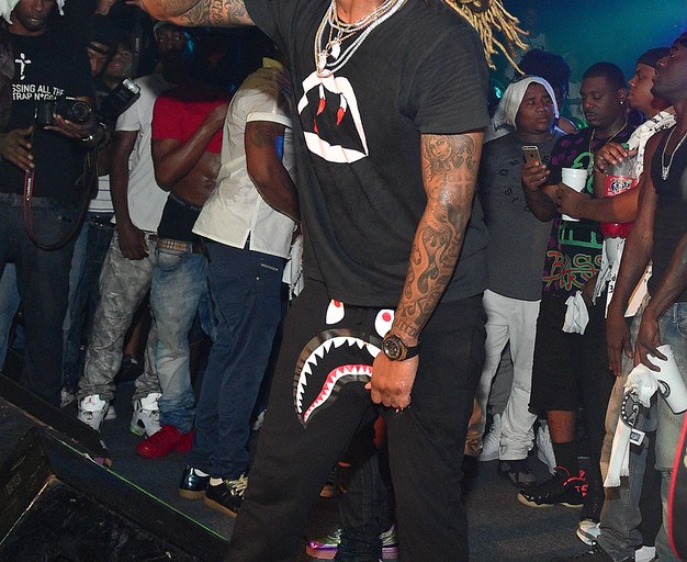 Men’s Fashion Flash: Future’s Atlanta Concert Saint Laurent Black Fang Print T-Shirt, Bape Shark Mouth Pants, and Red Jordan 11LAB4 Sneakers