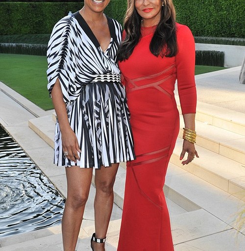 Tina Knowles Lawson wears a custom David Koma Cut Out Sheer Panel Red Gown to her Ebony Magazine Celebration + Desiree Rogers in a Givenchy Striped Pleated Kimono Dress and Givenchy Black and White Sandals + Linda Johnson Rice in a Peter Pilotto Printed Top and Floral Skirt