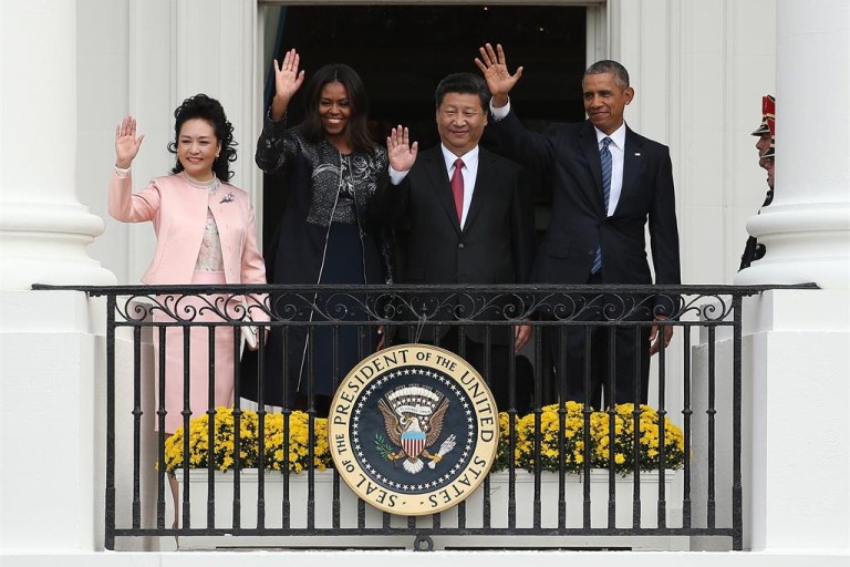 First Lady Michelle Obama Wears 3.1 Phillip Lim Midnight and Metallic Floral Dress and Coat at the State Arrival Ceremony of Chinese President Xi Jinping and Madame Peng Liyuan