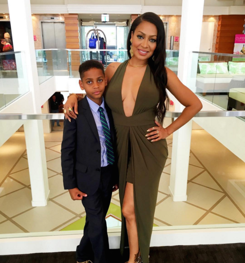 Splurge: Lala Anthony’s Father’s Wedding House of CB Olive Green Crista Long Halter Maxi Dress