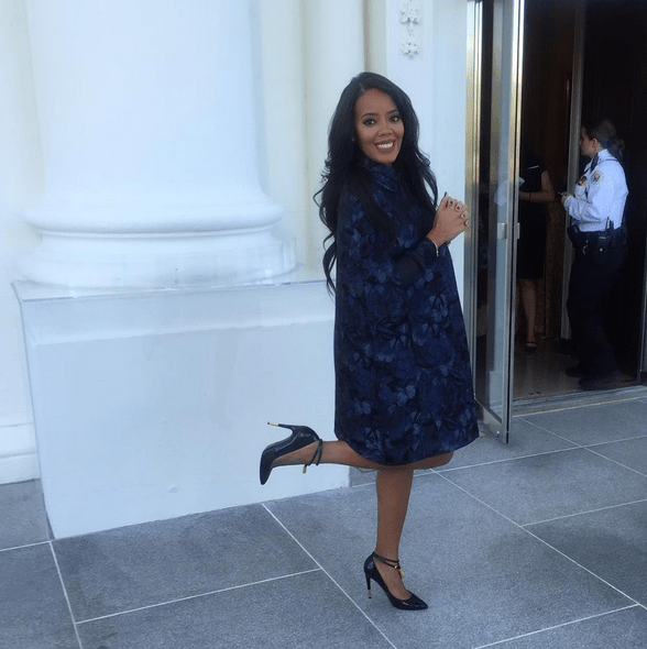 Splurge: Angela Simmons’s White House Better Make Room Announcement Valentino Navy Blue Butterfly Print Cape, Print Goergette Dress, and Tom Ford Black Padlock Pumps