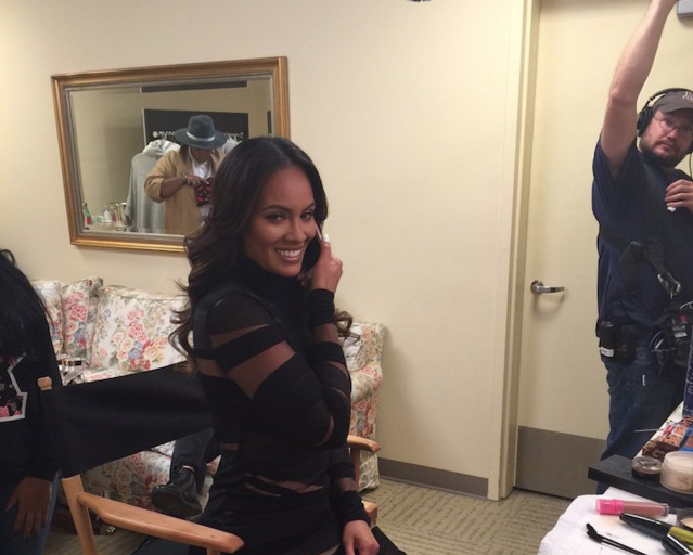 Wardrobe Query: Evelyn Lozada’s Twitter Livin Lozada Filming Emilio Pucci Black Banded Wool and Mesh Dress