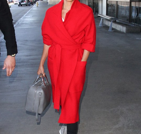 Splurge: Jada Pinkett-Smith’s LAX Red Sportmax Belted Coat and Adidas x Kanye West Yeezy Boost Sneakers