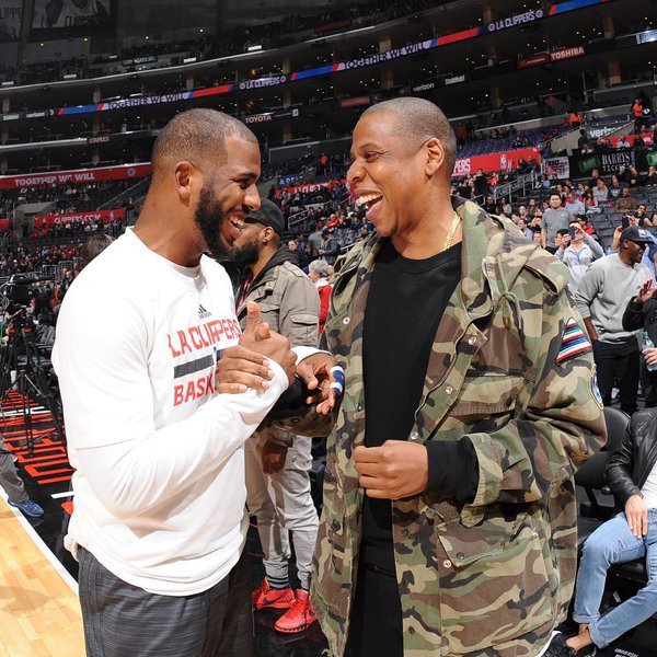 Men’s Fashion Flash: Jay-Z’s Miami Heat vs. Los Angeles Clippers Game Saint Laurent Oversized Camouflage Patched Printed Hooded Parka