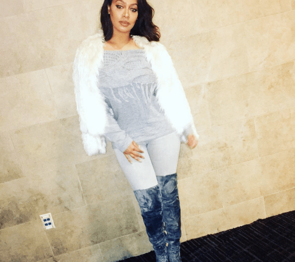 Splurge: Lala Anthony’s Instagram Intermix Exclusive Fringed Gray Off the Shoulder Sweater