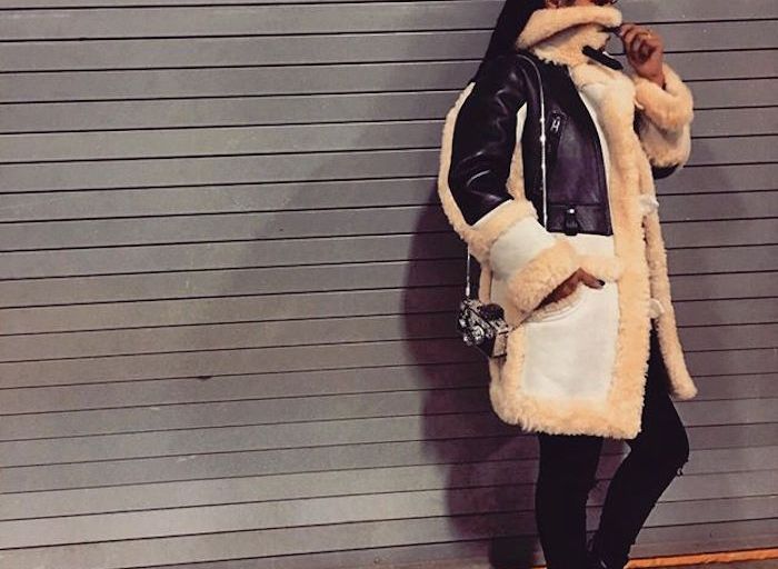 Get The Look: Teyana Taylor’s Instagram Coach Shearling And Leather Biker Coat, Louis Vuitton Monogram Canvas Desert Boots And Judith Leiber Mini Camera Clutch Bag