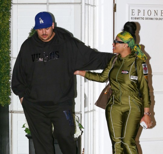 Splurge: Blac Chyna’s LA Milano di Rouge Olive Green Venus Mars Jumpsuit + Rob Kardashian’s Villans Black Hoodie Sweatshirt