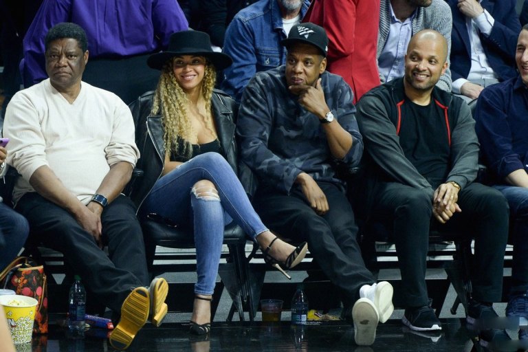 Splurge: Beyonce’s Clippers vs. Thunder Game Saint Laurent Classic Leather Jacket, Genetic Denim Shya Cigarette Distressed Jeans, and Gianvito Rossi Suede & Mesh Ankle Strap Pumps + Jay Z’s Valentino Camouflage Print Sweatshirt