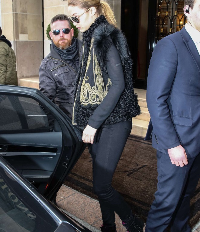Splurge: Gigi Hadid’s Paris Etro Embroidered Shearling and Wool Vest and Oscar Tiye Black Samira Suede Boots