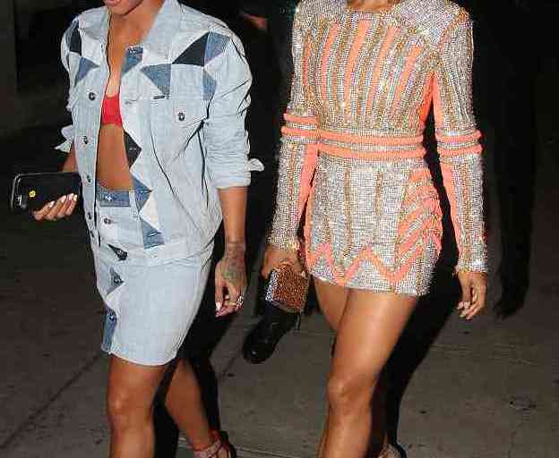 Get the Look: Karrueche Tran’s I Heart Radio Awards After Party Diesel Patchwork Denim Jacket, Skirt, and Gucci Monogram Supreme Sandals + Serayah in Beaded Nicolas Jebran