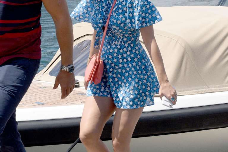 Splurge: Katy Perry’s Port Gallice Linda Farrow x Dries Van Noten 100 C6 Sunglasses, Valentino Short Sleeve Silk Star Playsuit, and Mansur Gavriel Blush Suede Mules
