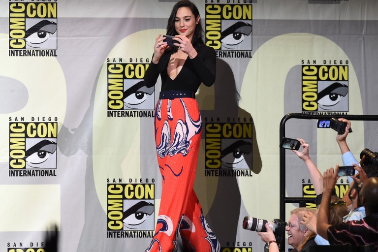 Splurge: Gal Gadot’s Comic-Con International 2016 Warner Bros. Presentation Solace London Black Amber Bodysuit and Zoya Red Print Trousers