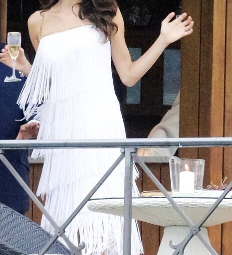 Splurge: Amal Clooney’s Villa Camilla Darfur Fundraiser Great Unknown Ivory Vintage Tassel Dress and Marchesa ‘Clara’ Gold Floral Laser Cut Sandals