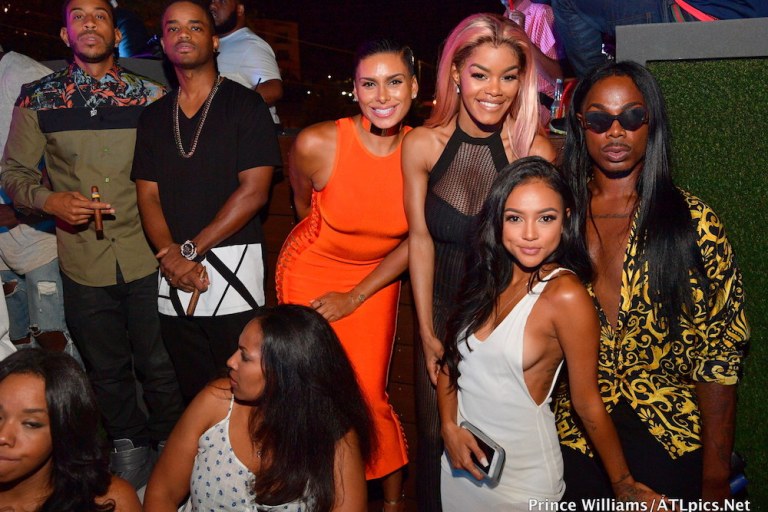 Ludaday Weekend Style: Ludacris in Versace’s Contrast Floral Print Olive Green Shirt, Laura Govan in House of CB’s Martinique Orange Side Weave Bandage Dress, Karrueche Tran’s Nasty Gal White Sheer Mini Dress, and More!