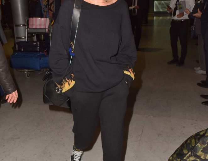 Steal: Bella Hadid’s Charles de Gaulle Airport $97 Hardware LDN Chloe Flame Top and $72 Joggers