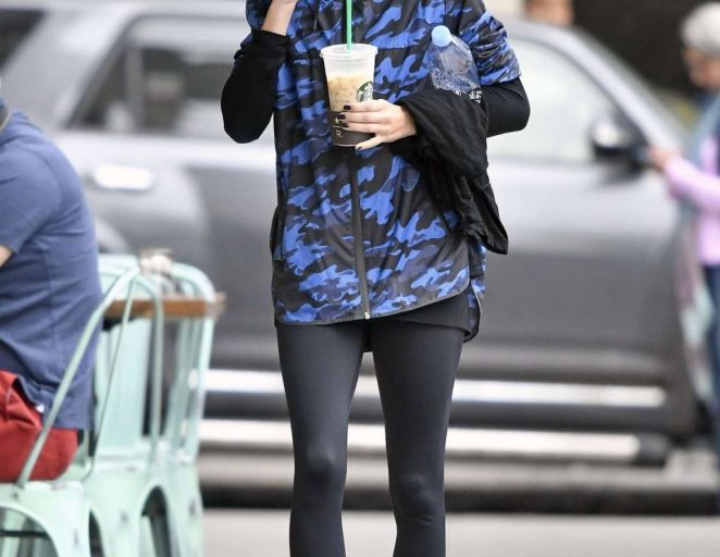 Splurge: Olivia Palermo’s New York City $150 Ivy Park Blue Camo Wrap Back Jacket