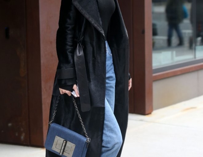 Splurge: Gigi Hadid’s New York City $2,240 Rihanna x Manolo Blahnik Dancehall Cowgirl Denim Boots and $2,290 Tom Ford Denim Natalia Shoulder Bag