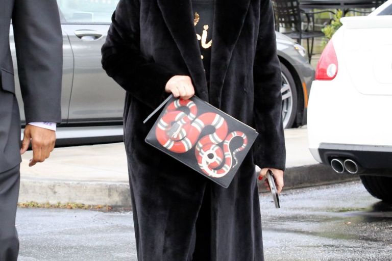 Splurge: Kris Jenner’s Calabasas, California $750 Gucci Snake Print Leather Pouch