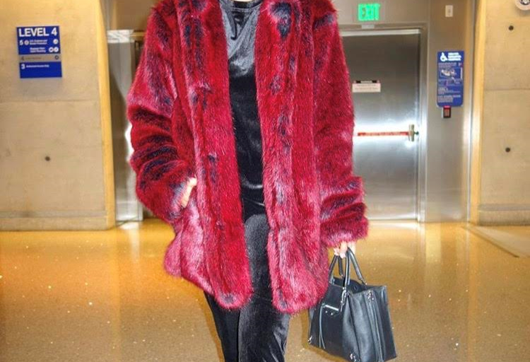 Splurge: Nazanin Mandi’s London LPA Faux Fur Hooded Jacket