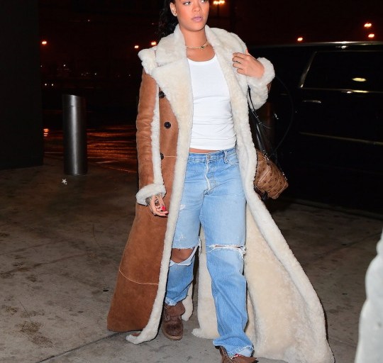 Splurge: Rihanna’s JFK Airport Chloe Reversible Shearling Coat, Louis Vuitton Palm Springs Backpack, and Timberland Heritage Boots