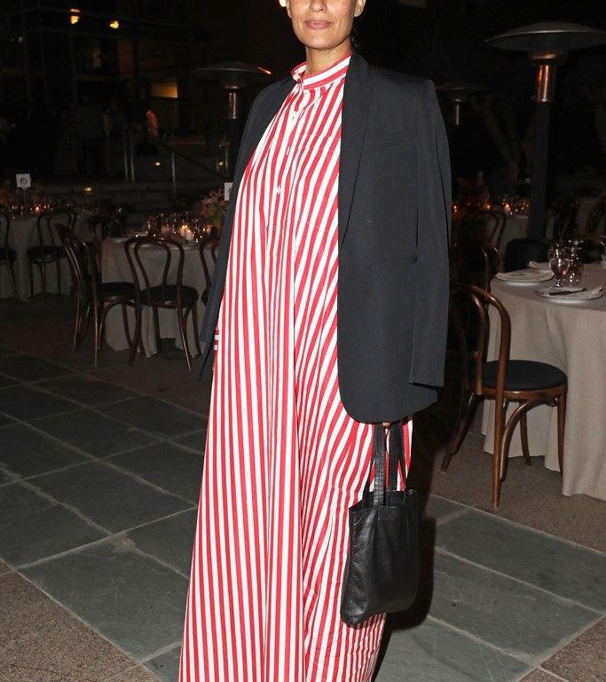 Splurge: Tracee Ellis Ross’s MOCA’s Leadership Circle and Members’ Opening of Kerry James Marshall: Mastry $1,295 Balenciaga Red and White Asymmetric Sleeve Striped Maxi Dress