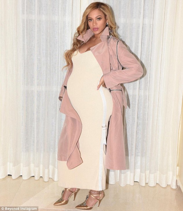 Splurge: Beyonce’s Alvin Ailey Dance Theater A.F. Vandevorst Trench Coat and Alberta Ferretti Embellished Snake Pumps
