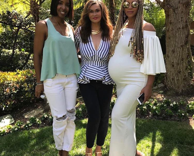 Get the Look: Beyonce’s Easter Mina Roe Off White Ruffle Sleeved Yasmin Dress and Prada Metallic Sandals + Tina Lawson’s Johanna Ortiz Ruffled St. Bart’s Top