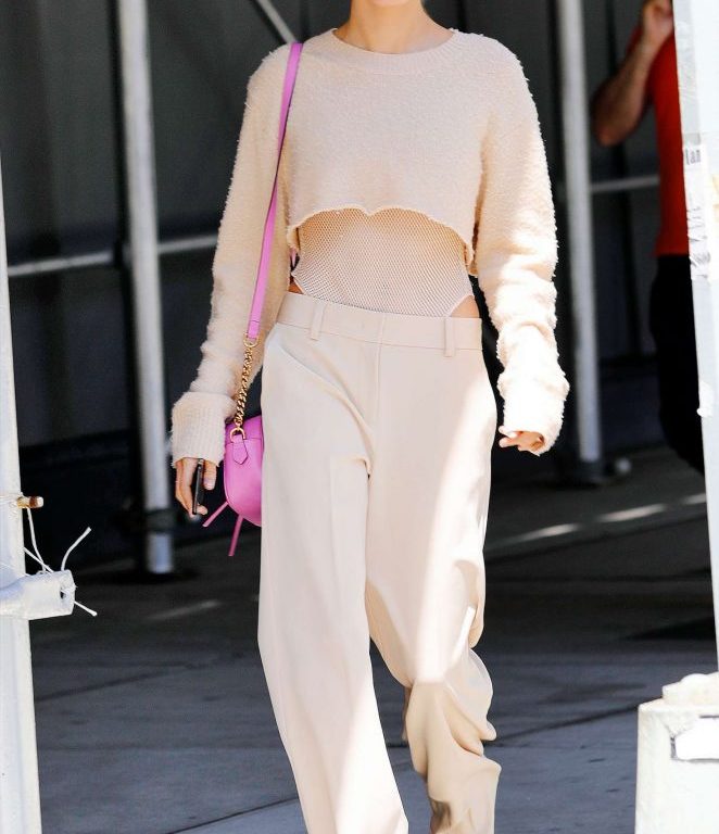 Splurge: Hailey Baldwin’s New York City $246 Vatanika Ultrasuede Paneled Sheer Mesh High-Cut Bodysuit and $980 Gucci GG Marmont Pink Mini Bag