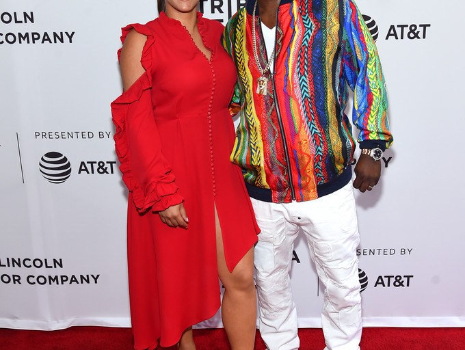 Splurge: Megan Wollover’s <em>The Clapper</em> 2017 Tribeca Film Festival Premiere $1,895 Madga Butrym Red Marbella Asymmetric Ruffled Silk Crepe Midi Dress + Tracy Morgan’s Coogi Silk Bomber Jacket and Sneakers