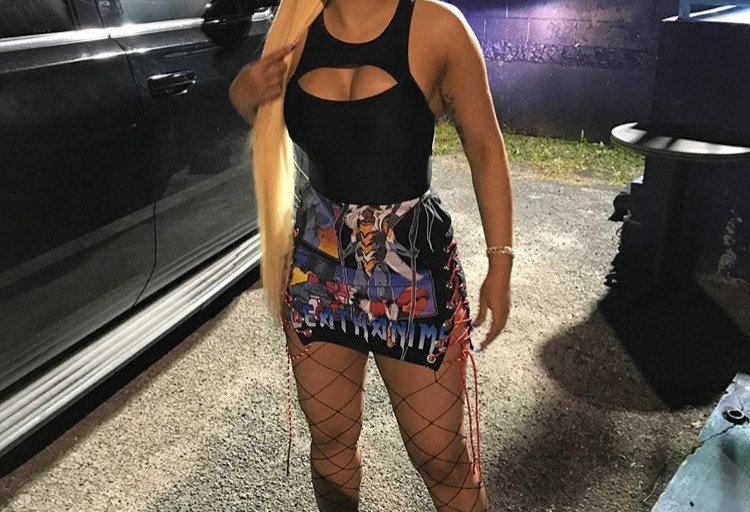Splurge: Cardi B’s Instagram HMN ALNS Silver Grommet Paracord Lace Up Front Graphic Print Skirt