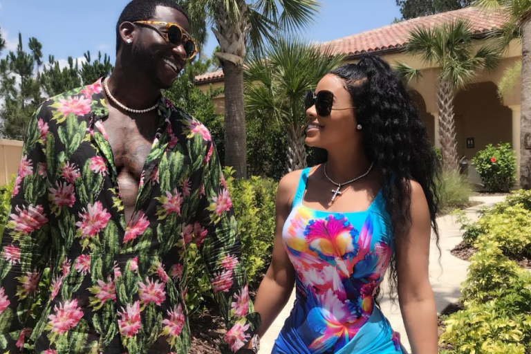 Keyshia Kaoir Vacations in Style Wearing Gucci Logo and Gottex Blue Tropical Swimsuits