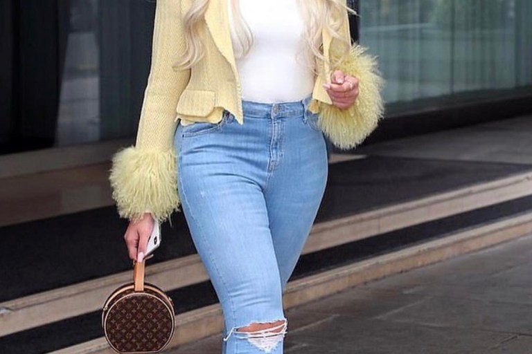 Jordyn Woods Steps Out In London in a Sami Miro Vintage Fur Trimmed Citron Jacket, Jeans, and a Louis Vuitton Purse + Her Myae Made Turquoise Dress!
