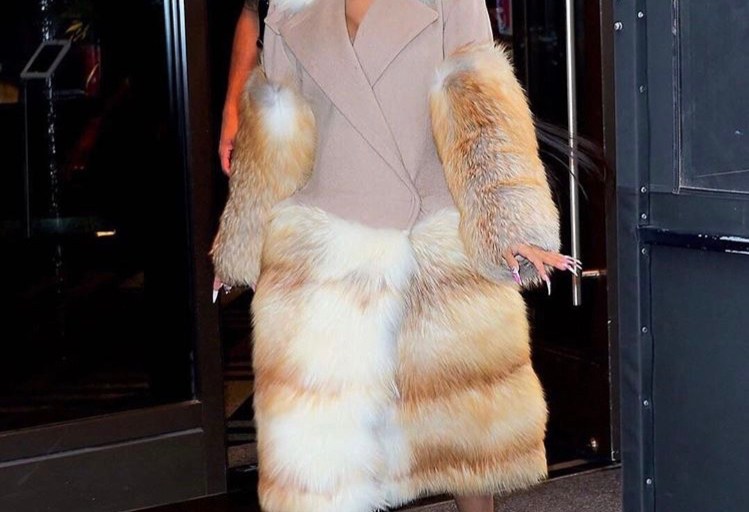 Cardi B Steps Out at Beautycon Wearing A Paco Rabanne Fur Trimmed Coat, Casadei Metallic Pumps, and a custom Sarah Sokol Millinery Hat