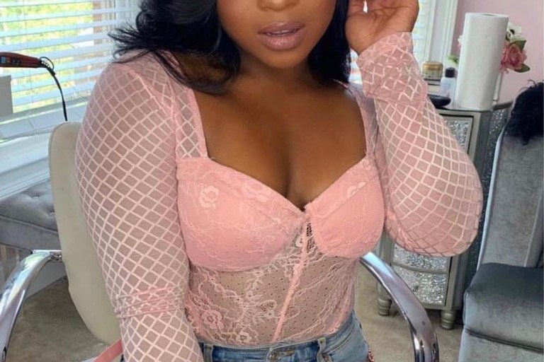 Reginae Carter sits Pretty in Fashion Nova Whatever You Want Bodysuit