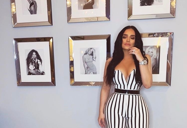Emily B. Looks Like a Star in Black and White Stripes: Jumpsuit by Fashion Nova
