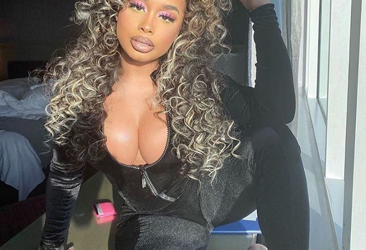 Dream Doll Is Dressed to Impress in a Fitted Fashion Nova Black Velvet Zip-Up Jumpsuit