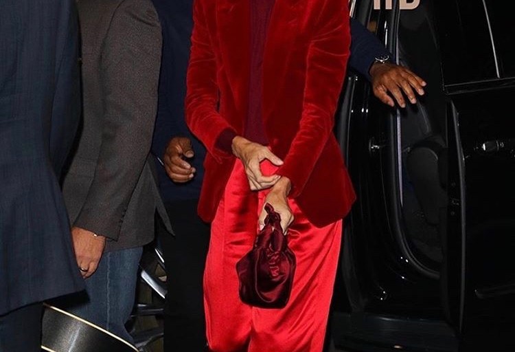 Celine Dion Puts us in the Perfect Holiday Spirit Wearing a Dashing Red Velvet Tom Ford Blazer, Turtle Neck & Silk  Pants Ensemble