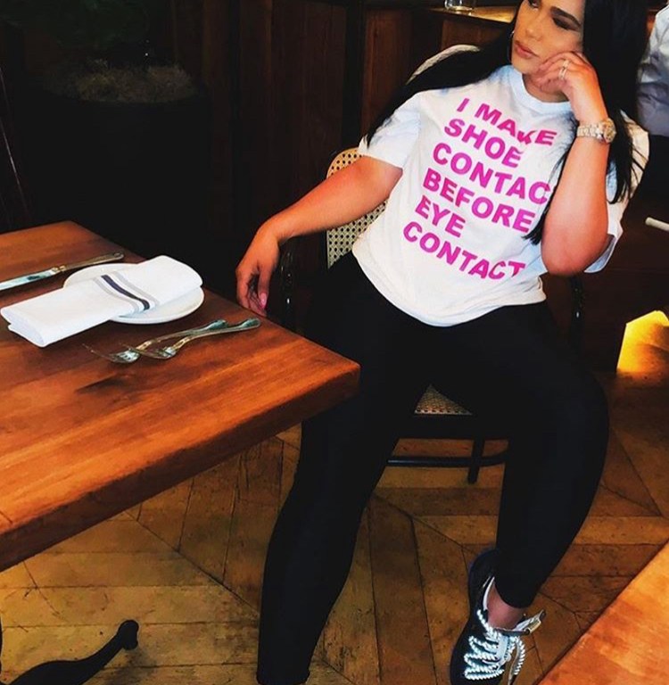 Emily B. Makes the Perfect Style Statement in her Fashion Nova White & Pink Tee