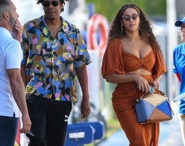 Beyonce Steps Out in Florida in Fe Noel Rust Brown Cut Out Dress Available at FashionBombDailyShop.com!
