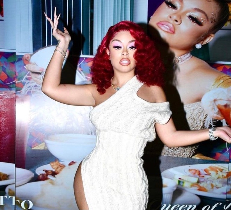 You Ask, We Answer! Mulatto Poses in an Off White Sweater Dress by Telfar