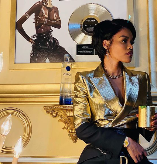 You Ask, We Answer! Teyana Taylor Celebrated New Years With Ciroc Rocking a $3,090 Black and Gold Alexander McQueen Blazer and $1,250 Dior Saddle Belt