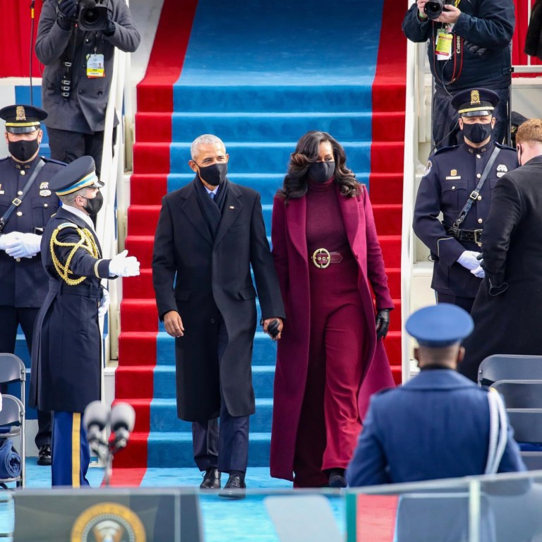 Michelle Obama Wears Sergio Hudson Burgundy Coat, Shirt, and Pants to the 2021 Presidential Inauguration in Washington D.C.