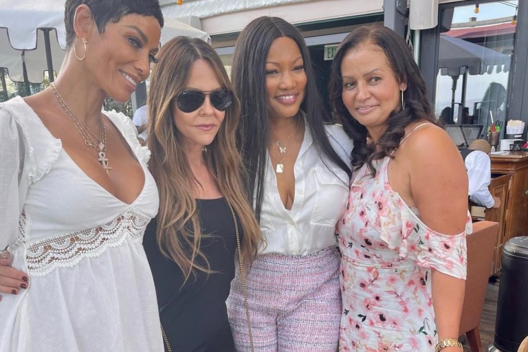 Garcelle Beauvais Spotted Out With Nicole Murphy, Allison Melnick, and Lisa Bubbles Wearing Cult of Coquette Silver Bow Sandals From Fashion Bomb Daily Shop