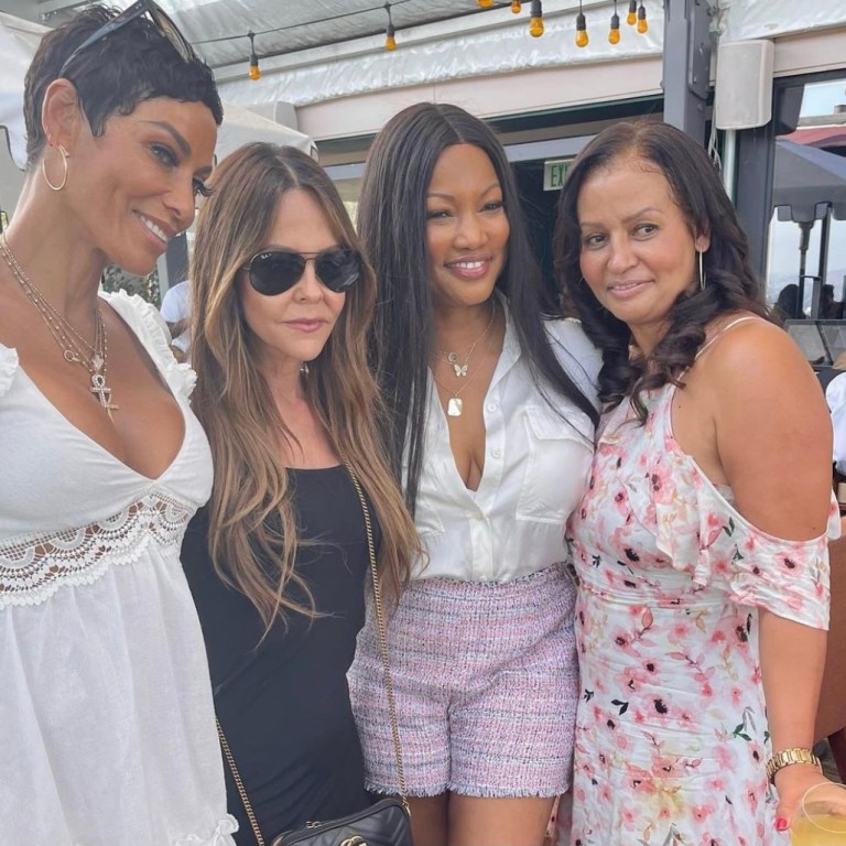 Garcelle Beauvais Spotted Out With Nicole Murphy, Allison Melnick, and Lisa Bubbles Wearing Cult of Coquette Silver Bow Sandals From Fashion Bomb Daily Shop