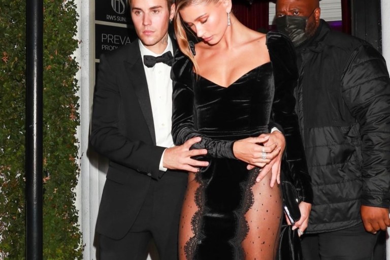 Hailey Bieber Attends Justin Bieber’s ‘Freedom Art Experience’ Exhibition in LA Wearing Alessandra Rich Fall 2021 Black Velvet Lace Dress