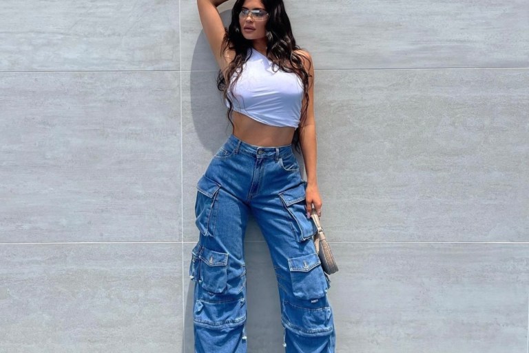 Most Requested: Kylie Jenner Poses in White One Shoulder Crop Top, the Attico Cargo Jeans and Alexander Wang Denim Pumps