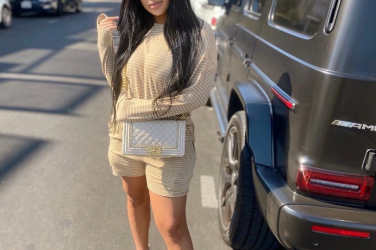 Taina Williams Spotted in Casual Look Featuring Fashion Nova Stripe Top and Short Set