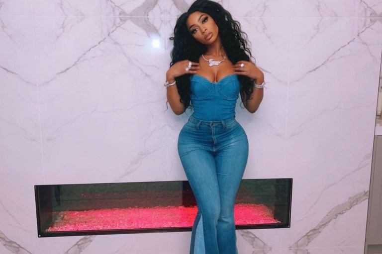 Tommie Lee Stuns in Denim Look Including Fashion Nova Frayed Flared Jeans