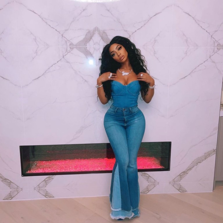 Tommie Lee Stuns in Denim Look Including Fashion Nova Frayed Flared Jeans